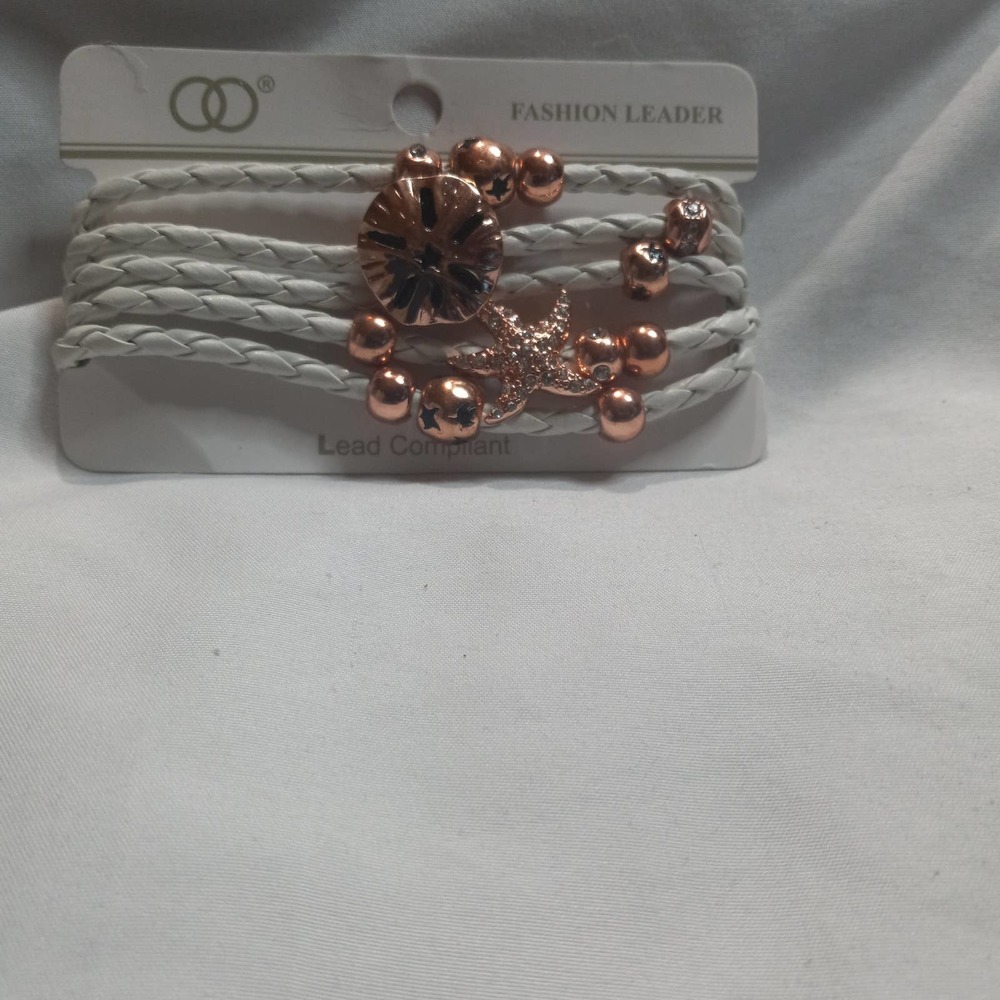 Fashion Leader white and Cooper bracelet with charms